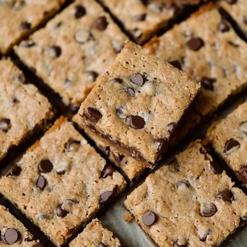 Delicious chocolate chip cookie bars on a plate