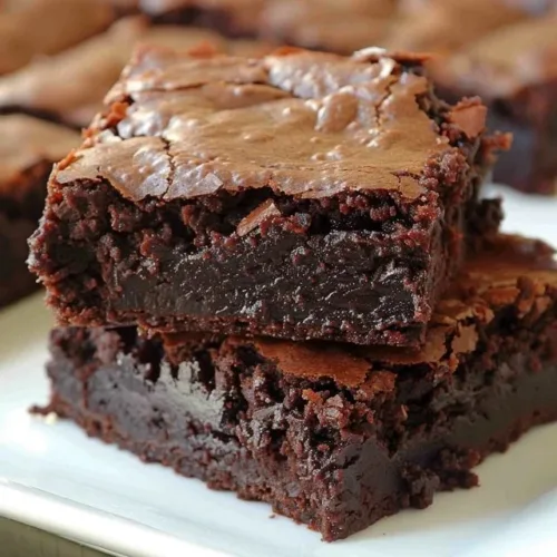 Delicious easy soft brownies on a plate, perfect for dessert lovers.