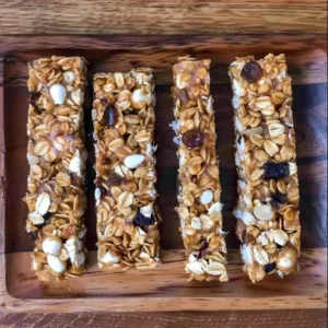 Chewy Homemade Granola Bars 3 Homemade granola bars made with oats, nuts, and dried fruits.