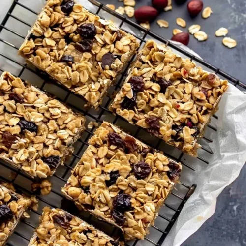 No bake granola bars made with oats, nuts, and honey.