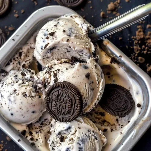 Delicious cookies and cream ice cream in a bowl with chocolate cookie chunks