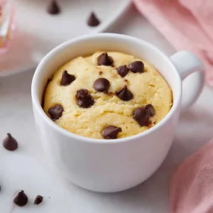 Delicious cookie in a mug ready in minutes for a quick dessert.