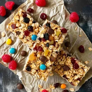 Homemade granola bars made from oats, nuts, and dried fruit.